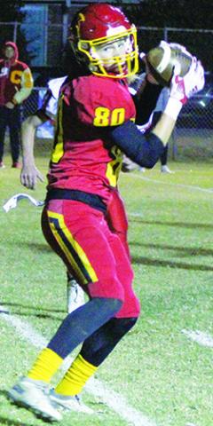 Titan Sophomore, Jace Midgett, makes the catch on the 2-pt conversion to tie the game, 20-20, in the JV double OT loss to Caney at Titan Stadium, Monday.