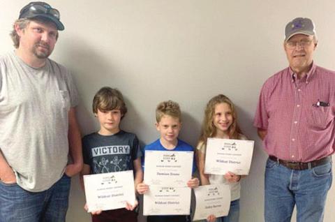 Recently Wildcat District 4-H members competed in the Kansas Wildlife Habitat Education Program. Left to right are Coach Brian Elsworth, Raylan Elsworth, Damien Evans, Zailey Burrow and Coach Dan Peterson.