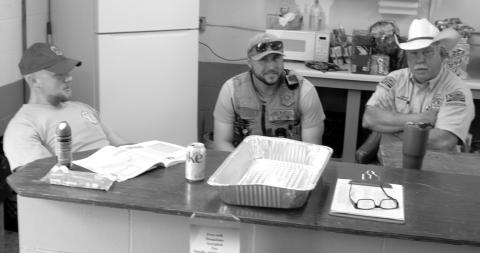 Taking a break while the students enjoy breakfast at the Hunters Safety Course, the three Conservation Officers were discussing changes in the conservation law during the recent legislative session. The officers are Austin Seoers, Colby Austin and Jim Bussone.