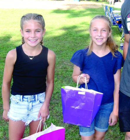 The Freedom Fest girls sack race competition in the seven to 12 division was won by Tyler Kirk and second place went to Lucy Zahm.