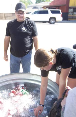 Sheriff Brian Henderson was overseeing the soda choice at the Back the Badge barbecue.