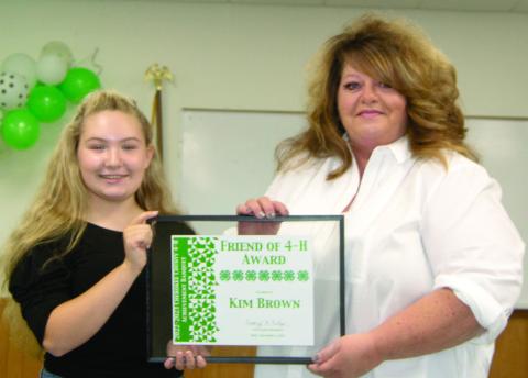 The Friend of 4-H Award went to Kim Brown and her crew at Team Threads recognizing their support of the 4-H programs and activities. She has donated time and resources to the programs. President Amory Neely presented the award.