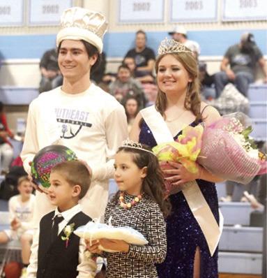 Cade Burdette and Samantha Dietz were crowned Southeast Homecoming King and Queen. Crown bearers were Jacob Nichols and Paislee Fowler. Both the Southeast boys (69-37) and girls (39-27) were victorious over Colony Crest at SE Homecoming February 3. Courtesy photo.