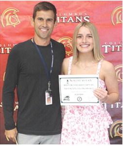 Columbus Titan Head Wrestling Coach presented a four-year wrestling scholarship to senior, Brooklyn Collingsworth from Northeastern (Oklahoma) State University in the total amount of $20,000 during the May 15, 2026 Senior Assembly at the CUHS Gymnasium.