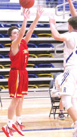 Titan Freshman, Luke Gray, shoots one of his three, three-point shots in the Columbus C Team win over Riverton, 30-20, Tuesday in Riverton. Gray had 11 points to lead the Titans in scoring. Ram Freshman, Noah Harper, defends.