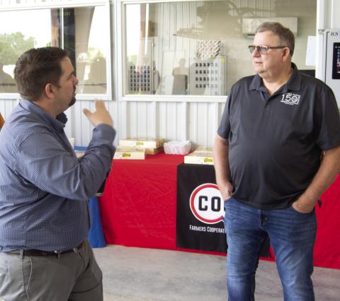 Matt Case with Farmers Coop talked with Mayor Grant Spieth at the May Third Thursday Coffee. Chamber members gathered to see what was new at the Agronomy Center.