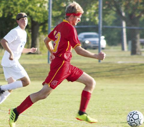 Titan Senior, Cody Ediger, pushed past a Parsons defender to score a goal in Tuesday’s home soccer match at the Central School Pitch. Parsons won 9-1.