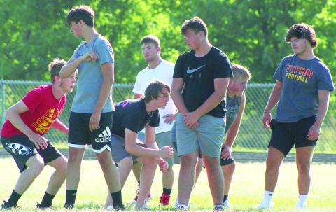 Titan Linemen work on technique during drills at the recent team camp. Senior, Rydge Delmont, right,was a second team All-District and All-CNC League selection in 2021. Seniors Jake Eddington and Fischer Troxell will help anchor both the offense and defense with returning sophomores, Carter Henry, Brandon Stice, and Owen Roberts with the addition of freshman, Luke Breeden.