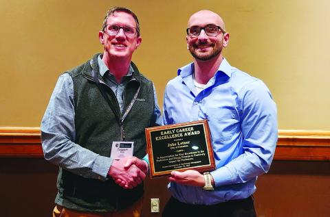 Taggart Wall, Winfield City Manager presented Columbus City Administrator Jake Letner with a plaque signifying his “Early Career Excellence” from the Kansas Association of City/County Management. Letner received his plaque during the [KACM] Annual Conference was held in Dodge City