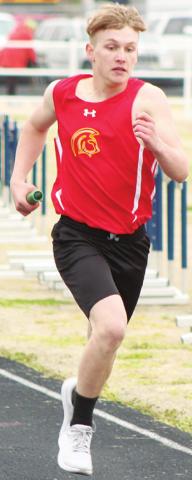 Central Titan Eighth Grader, Syler Schuberger, carries the baton in the Spring Medley at a meet in Galena. Schuberger and his Sprint Medley Relay Team of Landin Midgett, Brandon Stice, and Evon Mayfield won first place in the Girard Invitational Meet, Thursday. Syler placed fifth in the 400 Meter Dash with a time of 62 seconds.