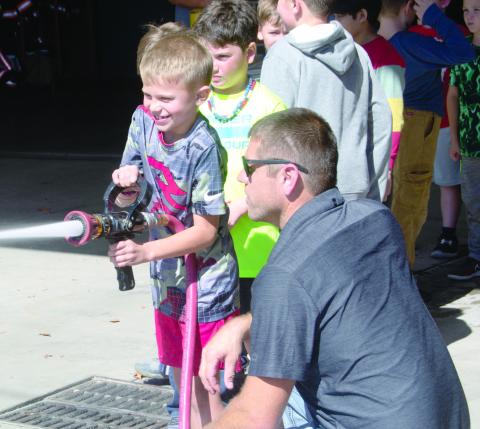 Lessons in operating a fire hose by firefighter Cody Burton 