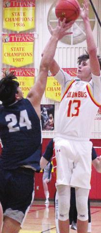 Titan Junior, Kolt Ungeheuer, drains one of his baskets against junior, Ty Hall, Galena, in Tuesday’s CNC League loss at the Columbus High School Gymnasium, 61-45. Kolt had a team-high, 15, points.
