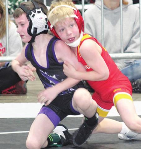Baylor Bowman, Columbus Wrestling Club six yearold placed third in the 8U, 49-pound class at the USAWKS 2022 State Championship, Sunday, in Topeka. Baylor placed third in the 6U state tournament in Mulvane the week before. Courtesy Photo.