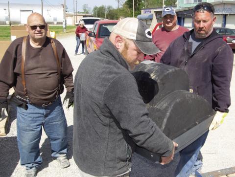 City workers Anthony Bole, Kenny Mitchell and Joey Midgett were working Saturday unloading electronic waste for the collection. Two semi-trailers-were filled in the five hours. Cherokee County Solid Waste Committee sponsored the event, chairman Jim Burton supervises the loading process.