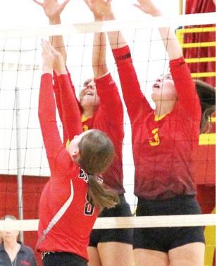 Lady Titan hosts triangular meet