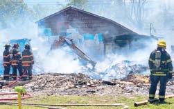 Columbus Fire Department was busy fighting a fire Sunday. Wind caused debris from a controlled burn into an adjacent house. Photo by Midwest Emergency Photography.
