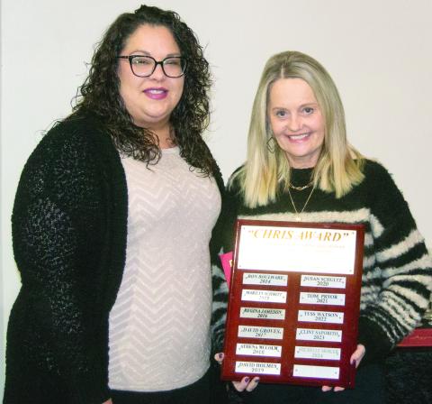 Receiving the Chris Award for her community involvement Michelle Mosler was presented by Becca DoByns. Her name will be added to the plaque and the long list of community leaders.