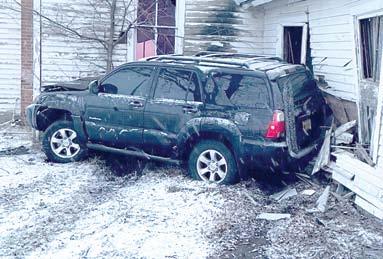 Snow and slick roads contributed to this accident Thursday evening. The driver lost control and spun into Blue Mound Church on Highway 166. Courtesy photo.