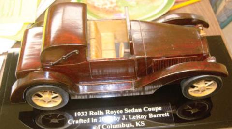 A new entry in the Mae Sherwood Art wing of the Columbus Museum is currently on display. The handcrafted replica of a 1932 Rolls Royce Sedan Coupe was made by the late CCRHS graduate J. Leroy Barrett. This piece of art is unique because it is made of wood from trees grown on farms in Cherokee County. This artifact is not old, but it is a work of art.