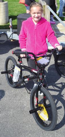 Baxter Springs Kiwanis Club gives bikes away at egg hunt