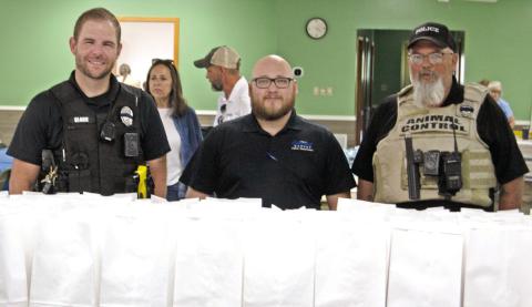 A large number of law enforcement officers and emergency services personnel came out to the fundraiser in support of the family of Jason Daniels. Chief Kyle Clark, Officer Marcus Harmon and Animal Control Officer Jeff Woods were among those in attendance. Chief Daniels was a vital part of the community and there will be a celebration of life service Saturday, June 8 in the Oswego City Park from noon to 4 p.m. for those who would like to attend.