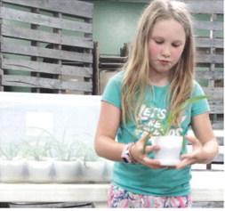 Faith Fryer gave a talk about her plants at the June Glittering Stones meeting. She also brought a plant she propagated for each member attending. Courtesy photo.
