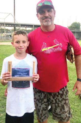 Coach, Todd Robinson presents the Riverton Little League 2021 Jimmy Gibson Memorial Sportsmanship Award to Matthew Gibson. Courtesy Photo.