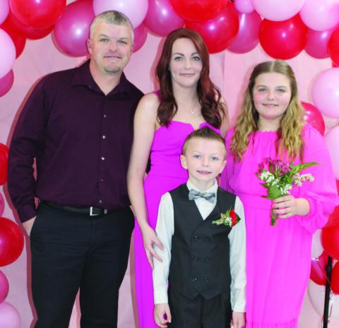 The recent elementary sweetheart dance gave families and friends of local students the opportunity to enjoy a night of music and fun. Proceeds from the event will be used for Columbus High School After Prom. The Cain family, Jacob, Jessi, Piper and Jaxon were among those attending the event.