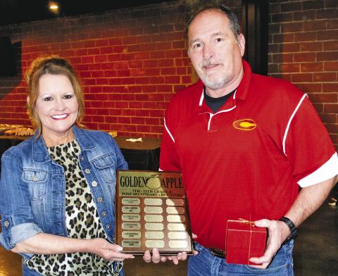 Ernie Vaughn was presented with a Golden Apple at a past Chamber banquet. Send your nominations to the Chamber of Commerce for the next award winner.