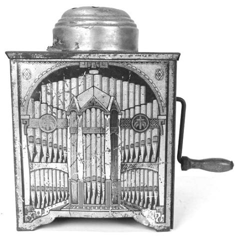 Tin lithograph music boxes like this one turned a luxury item into a simple toy. Their graphics usually featured instruments or musicians. Photo Credit: Copake Auction Inc.(c) 2026 by Cowles Syndicate Inc.
