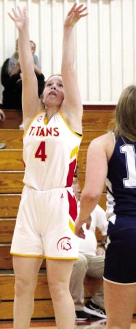 Lady Titan Bentley Townsend, scores two of her eight points in the eighth grade A, 20-23 loss to Galena, Tuesday at the CUHS Gymnasium.