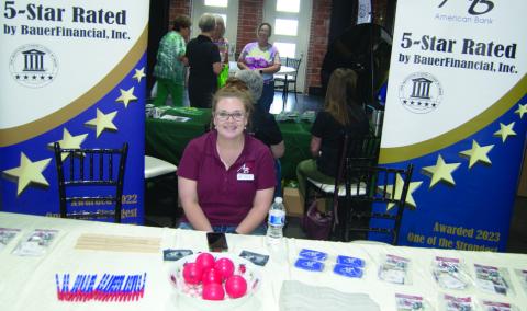 One of the active booths at the Business and Health Expo was the American Bank site. Jessica Gilman answered questions and passed out gifts to the visitors.