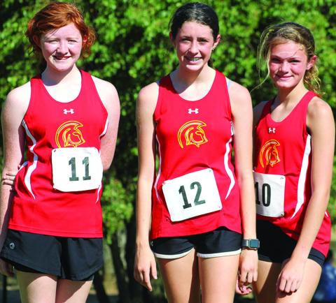 Members of the Lady Titan Eighth Grade Cross Country Team hosted a cross country meet, Tuesday, at the Brush Creek Golf Course. Kennedy Reichardt placed eighth, Natalie Wary was third, and Laney Atkinson placed fifth on the 3200 meter course.