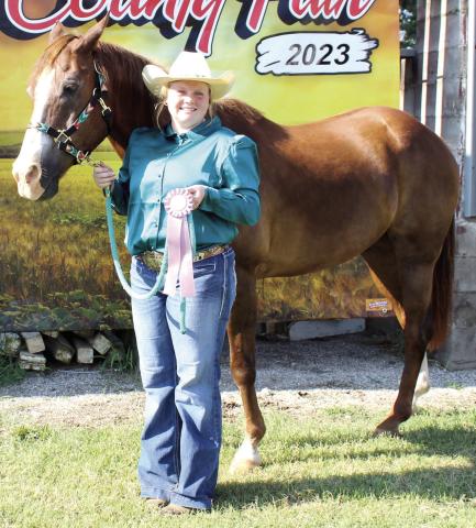 At the Cherokee County 4-H Horse Show July 22, Madisen Rand was the Reserve Champion in Senior Showmanship and received a blue ribbon in 2018 and before geldings Rand also received a red ribbon in Western Pleasure ages 14-18 and a white ribbon in Western Horsemanship ages 14-18.