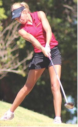 Tyler Kirk, Lady Titan Freshman, takes a shot during the recent Lady Titan Invitational at Brush Creek Golf Course in Columbus. Tyler tied for first in the Coffeyville JV Tournament, Wednesday, with teammate, Addison Johnson, to lead the Lady Titans to the Team Championship.