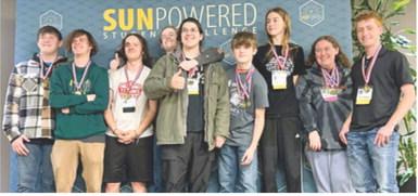 Columbus students Brenden Maxton, Kinden Riddle and Gabe Edwards were on the team that placed first in the Cooperative Challenge at the Solar Competition in Wichita in early April. Courtesy photo.