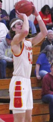 Titan Junior, Seth Stover, makes a jump shot on an in-bound play during third quarter action of the, 53- 41, Columbus win over Riverton, Tuesday night at the CUHS Gymnasium. Seth led both teams in scoring with 21 points.