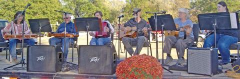 Aunt Bea and Friends band entertained at the Scammon Annual Fall Festival. The band has been part of several festivals in the area and are always popular with their string instruments.