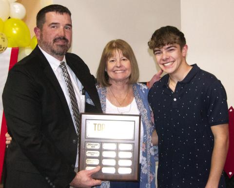 Columbus High School Principal Dan Grundy presented the Top Titan Award to Regina Jameson. She was nominated by Easton Long for the award.