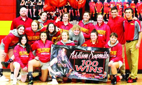 Lady Titan Senior, Addison Saporito, earned her 100th career win, Tuesday night, in a home dual win over Independence at the Columbus Unified High School Gymnasium. Addison celebrated with her team and coaches following the 54-18 win sweep over the Lady Bulldogs.