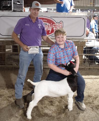 The Grand Champion Market Goat brought in a $1,600 premium during the Cherokee County Livestock Auction. Easton Haywood, Lone Elm Beavers 4-H club is the owner of the goat. The premium was paid by Columbus Veterinary Clinic, represented by Dr. Kurtis Gregory.