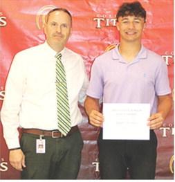 Senior Jayden Rodriguez received the Evelyn Waugh Scholarship from her grandson, Aaron Rider, USD 493 Principal. The $300 scholarship was presented at the May 15 Senior Assembly in the CUHS Gym.