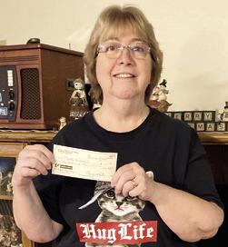 Myrtle VonWedell was the winner of the $100 prized in the drawings sponsored by Columbus Mercy Auxiliary. Winners were drawn at the December 19 meeting. Courtesy photo.