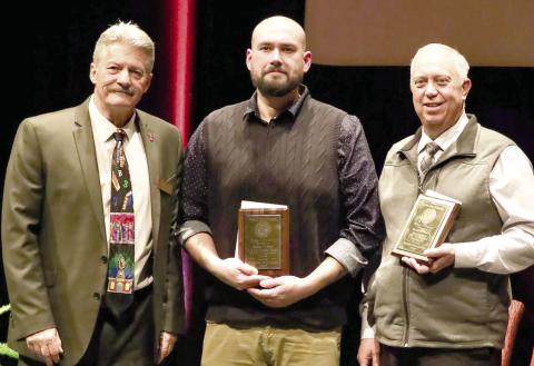 The PSU College of Education honored veteran administrator an accomplished teacher Dr. Brad Miner, (right) Superintendent at USD 247 in Cherokee with the Distinguished Service Award. In addition to Dr. Miner, Shawn LaSota (center) an English language teacher in Erie received the recognition. The awards were presented by Dean John Opplinger. Courtesy photo.
