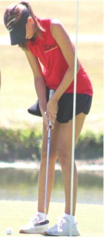 Lady Titan Sophomore, Addison Johnson, lines up a putt at the recent Lady Titan Invitational at Brush Creek Golf Course. Addison tied for first in the Coffeyville JV Tournament, Wednesday.