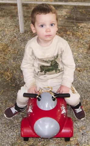Finding the Easter egg with the grand prize of a rocket ship riding toy Orion Halcott, Columbus was the under two year grand prize winner at Saturday’s Columbus Chamber of Commerce Easter Egg Hunt.