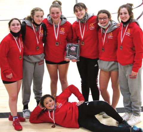 The Columbus Lady Titan Wrestlers placed second at the Burlington Girls Total Team Tournament, Saturday. Columbus captured 141.5 team points with eight wrestlers. Shown with their second place plaque and team medals are Lizzy Welch, Addison Saporito, Dixee Lacen, Emily Welch, Sophie Lloyd, and Madelyn Garcia. Front: Brooklyn Lima. Not pictured, Jailyn Rodriguez. Courtesy Photo.