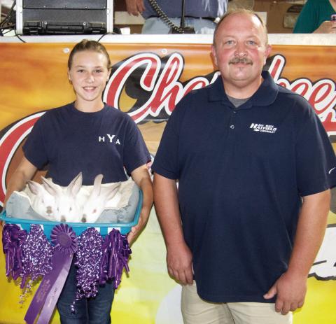 Heritage Youth Association member Katherine King received a $1,200 premium as the Grand Champion Rabbits from Jay Hatfield Motor Sports. She is the daughter Ross and Charla King, rural Columbus. There were just two entries in the Rabbit premium sale and they brought a total premium of $1,400.
