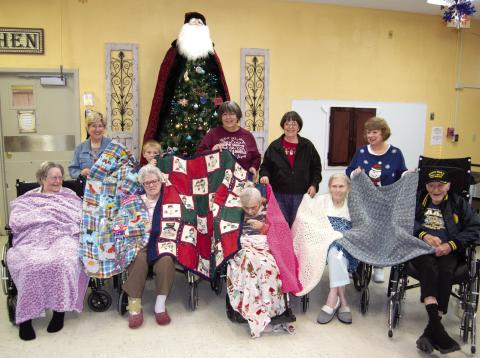 Residents at Medicalodges of Columbus will be a little warmer this year thanks to the Cherokee County Knitting Crocheting and Sewing Group. They provided blankets for the patients at the care facility. The patients accepting the gifts were Sally Saporito, Imy Jones, Jean Swain, Joanna Parsons, Ge Ge Sachetta. Those delivering the handiwork were Cindy Gleason, Jacob Holden, Gina Peak, Joleen Walden and Karen Langerot.