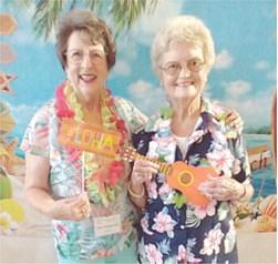 A Hawaiian luau theme was chosen for the Annual Convention of the Kansas State Chapter of the P.E.O. Sisterhood held in Manhattan. Local members Mary Kirkpatrick and Alma Cook, along with their husbands Jim Kirkpatrick and Paul Cook, were in attendance. Courtesy photo.